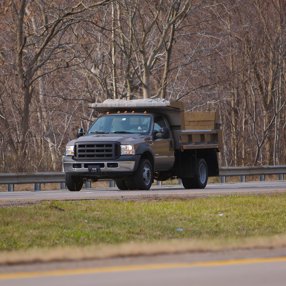 Highway diesel truck with black pollution