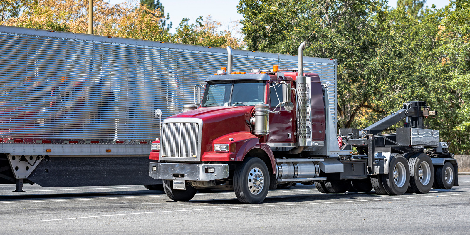 Row of Red Semi Trucks parked